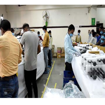 Artisans finishing handcrafted products